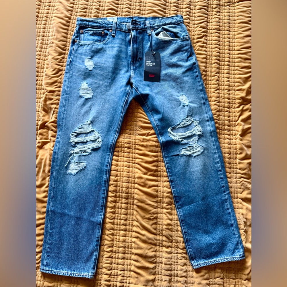 Brand new, still with tags, never worn 502 Levi’s.